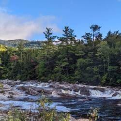 Driving along Kancamagus Highway - Swift River