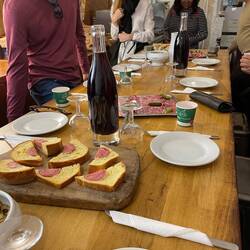 Tasting of the saucisson in the cellar