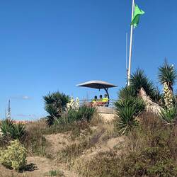 3 lifequards overlooking miles & miles of beaches. Got in trouble for taking this pic.