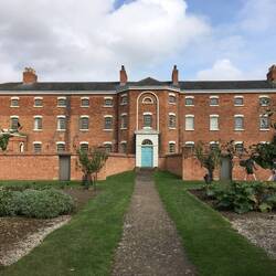 Front of the Workhouse.  Men's quarters on the right, Women's on the left.