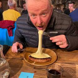 Ian enjoying his aligot - he and Jerome were the only ones to finish their plates!