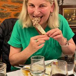 Bronwyn enjoying her pork