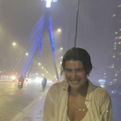 Jordan brave it without the umbrella for a few moments