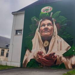 Fresque murale à Morlaix, par 2 Hollandais : "femme de pêcheur" priant pour son retour sain et sauf.