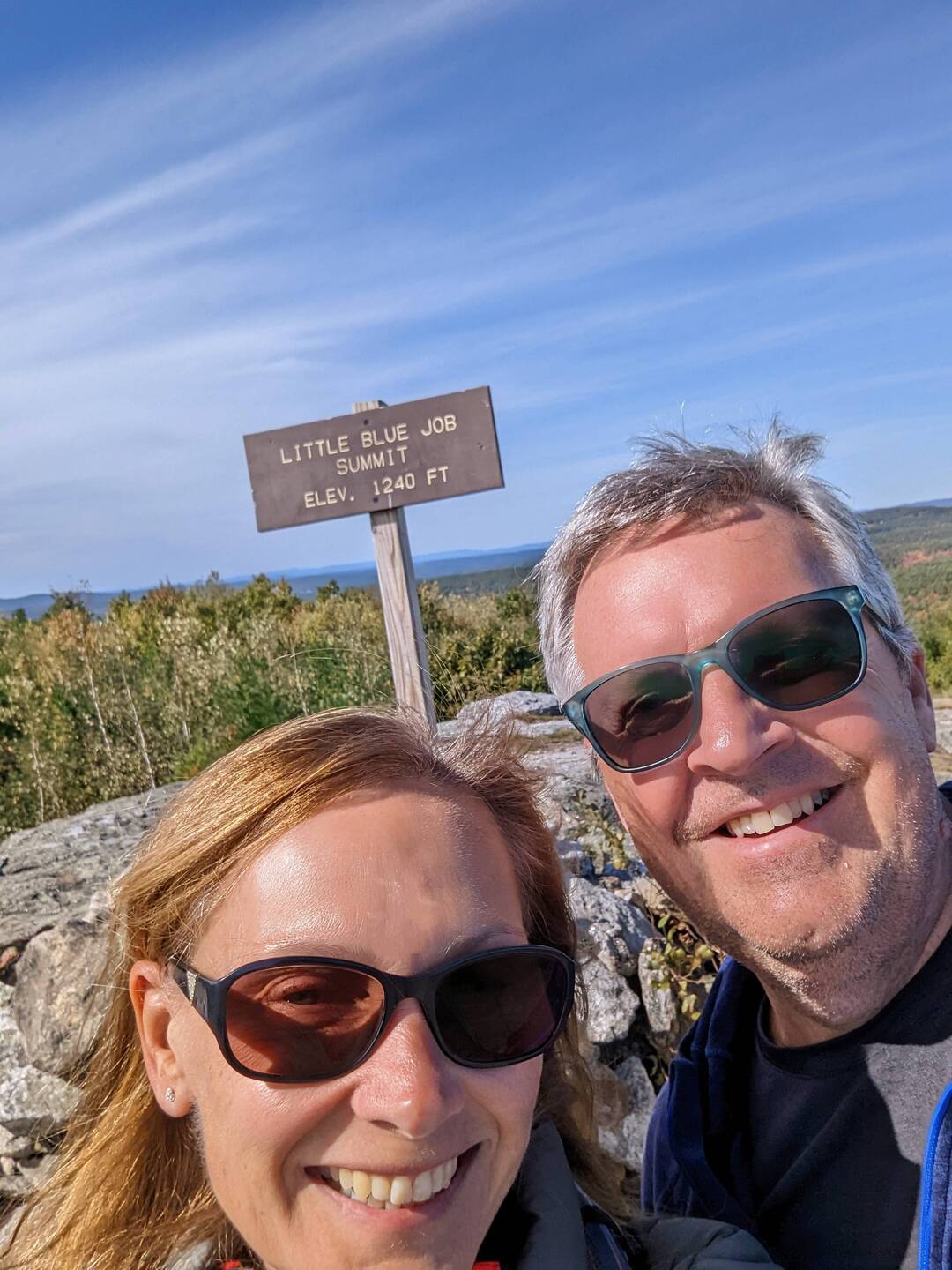 Reaching the top of Little Blue Job Mountain