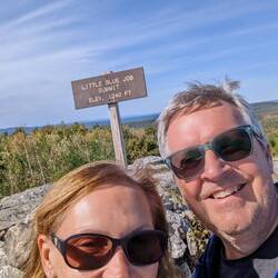 Reaching the top of Little Blue Job Mountain