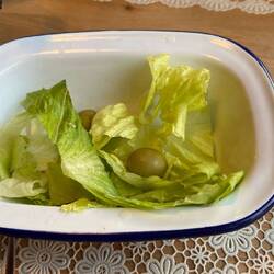 The salad....about 5 pieces if lettuce and 3 olives LOL!