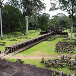 Elevated walkway leading to the temple.