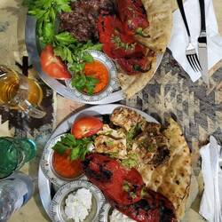 Pljeskavica - minced veal and beef (top) and Pileci fileti - Grilled chicken (bottom).