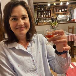 Maria enjoying her Eau de Vie