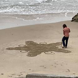 Sand art being created