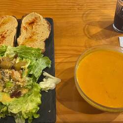Another delicious vegetarian meal: creamed vegetable soup, salad with quinoa and toast with hummus