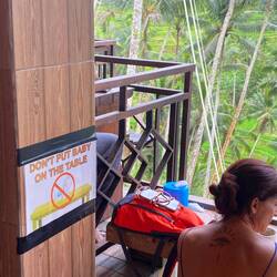 One would ask what idiot put their baby on this table to make this sign necessary???