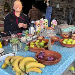 Paula at the hippy dippy albergue donitivo breakfast table