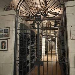 The family's private wine cellar behind a big locked gate