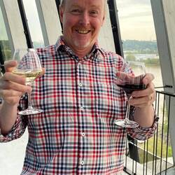 Happy man - a glass in each hand!