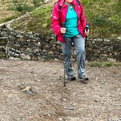 Annette slogging up the hill foe the view