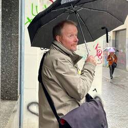 Ian trying to stay dry