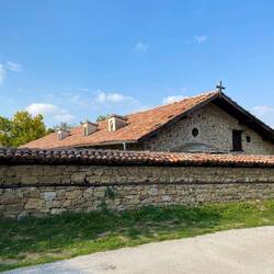 Exterior of the church is low to the ground. Many features of the building maintained security.