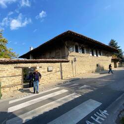 Exterior of the ethnographic museum- a house with high walls for protection.