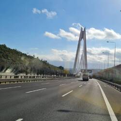 a gigantesque brand new 6 lane highway with ultra modern bridge crossing the Isthmus into Asia
