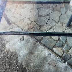 A glass feature in a new shopping centre - the ancient road