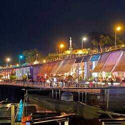 The promenade full of people dining out