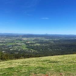 The pimples in the distance are the Glass House Mountains
