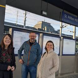 Deanne, Charlie, and Angela at the station