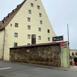 Original stone wall at the back of the Sausage Kitchen