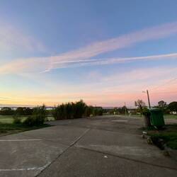 Pink morning sky all around.