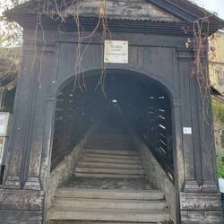 Covered Stair case lead up up to the hilltop Biserica din Deal