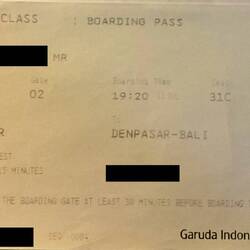 Boarding pass for GA621.