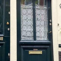 Lovely lacework on the door - apparently the Dutch don't have curtains!
