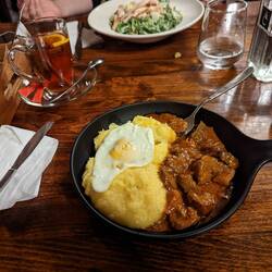 Caesar Salad (top) & Moldavian Stew (bottom). Also pictured is a mulled alcoholic tea