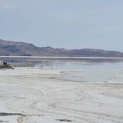 Ferryboat locked in crusty salt waiting for water to be able to sail again