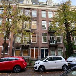 Each house has 2 doors. One closest to windows is for ground floor, other for stairs to upper floors
