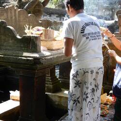 Devotees participating in the purification ritual, Tirta Empul.
