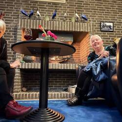 Having a drink by the fire at Homeland