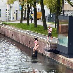 Crazy people jumping into the freezing water