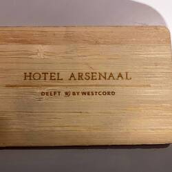The key card is made of wood