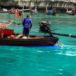 Car engine mounted to back of the boat
