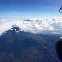 View of east Java's volcanoes. In 1993, I stared in awe at these volcanoes from the Java-Bali ferry.
