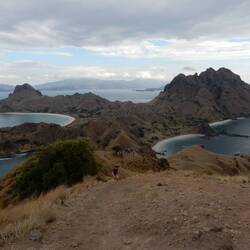 Padar Island - white sand beach on the right, pink and black sand beaches on the left.