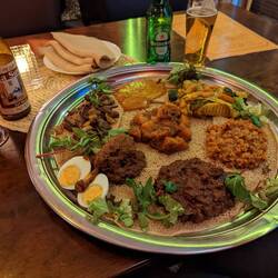 Our Ethiopian dinner: "Maheberawi", a variety of meat and vegetable dishes.