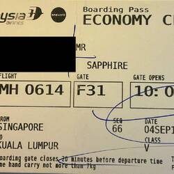 Boarding pass for MH614.