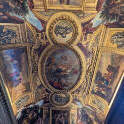 The Venus Room. Parts of the garland in the wooden frame blend into painted parts of the ceiling.