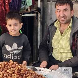 Father and son selling dates