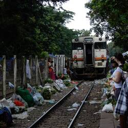 The vendors cleared the tracks as the train rolled into Daryingon station.