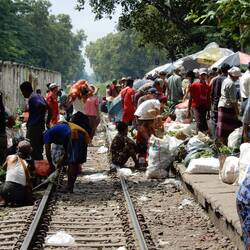 Vendors along the tracks at Daryingon station.